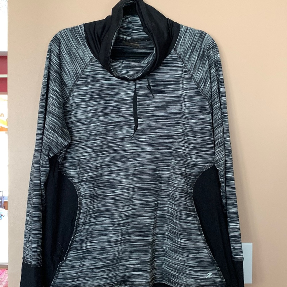Black and gray striped Energy Zone athletic pull over with 2 front pockets.